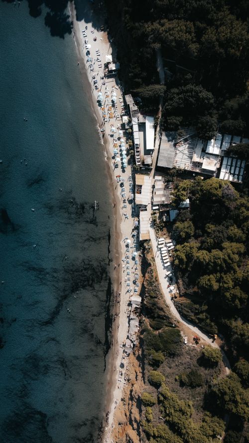 Free Stunning aerial shot of Lopud Island coastline in Croatia showcasing the beachfront and lush greenery. Stock Photo