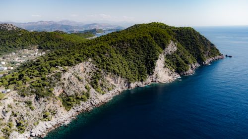 Free Breathtaking aerial view of Lopud Island's lush coastline and clear blue sea in Croatia. Stock Photo