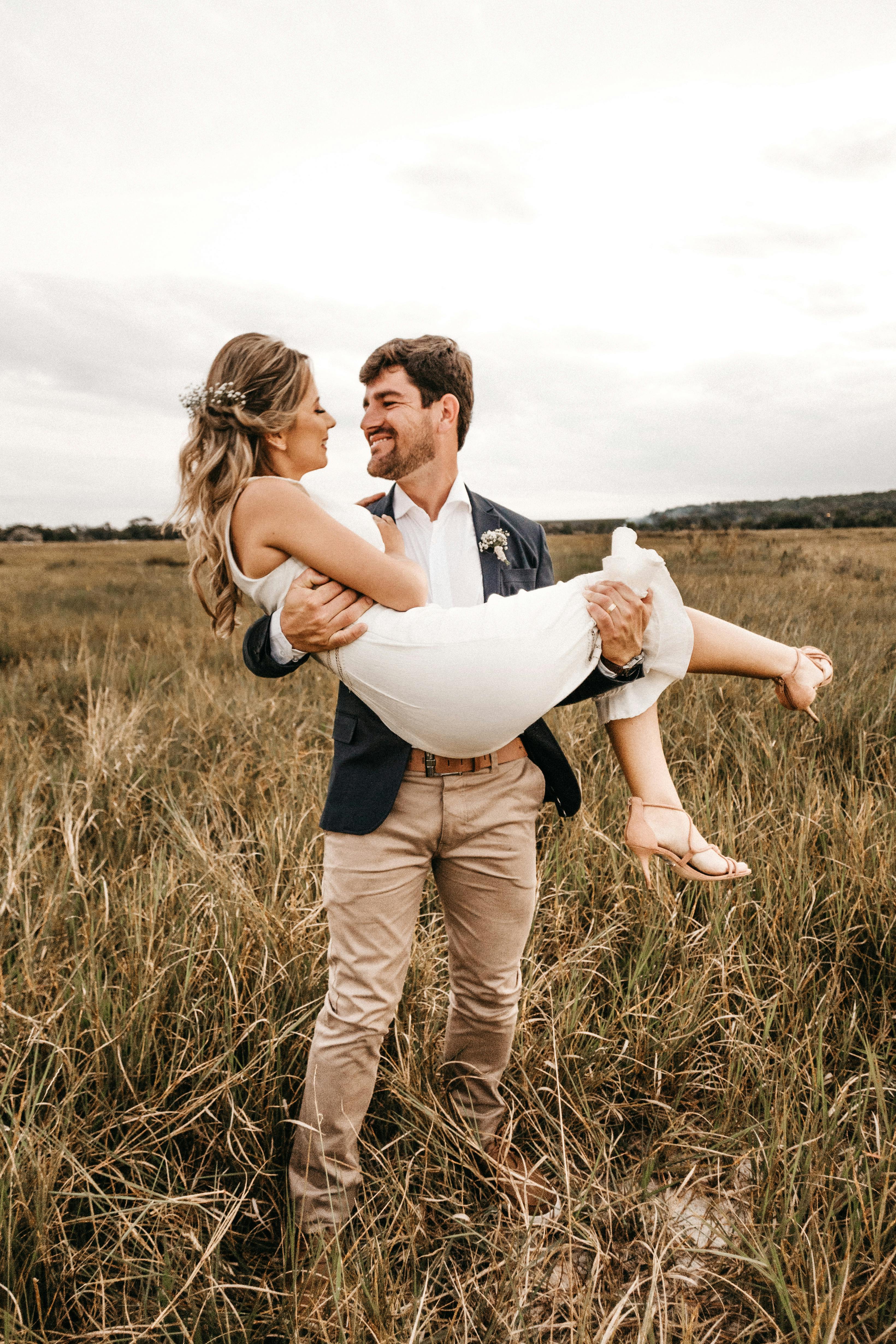 Man Carrying Woman · Free Stock Photo