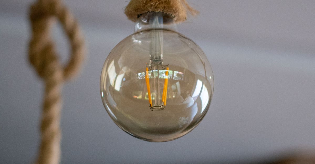 Open Bulb With Rope Vintage Edison Bulb Hanging from Twisted Rope · Free Stock Photo