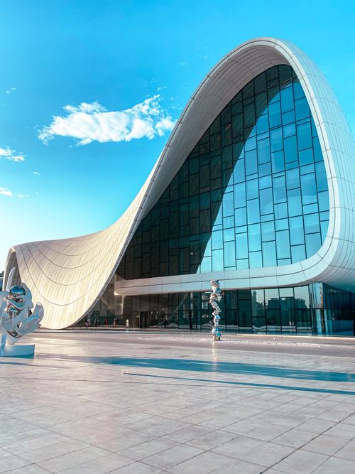 Free Explore the modern curves of the Heydar Aliyev Center in Baku, Azerbaijan's architectural gem. Stock Photo