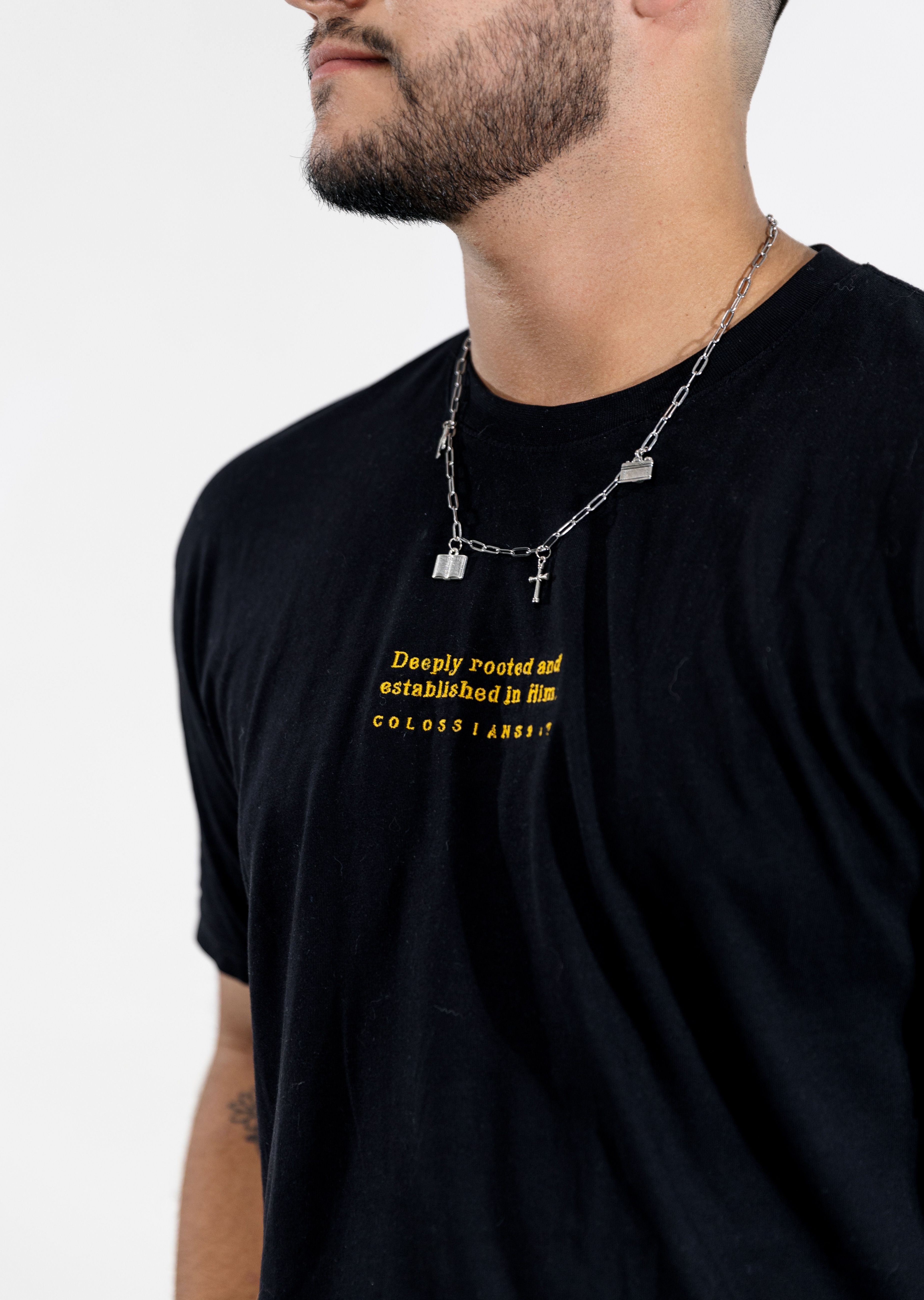 Casual Portrait of Man Wearing Black T-shirt and Chain · Free Stock Photo