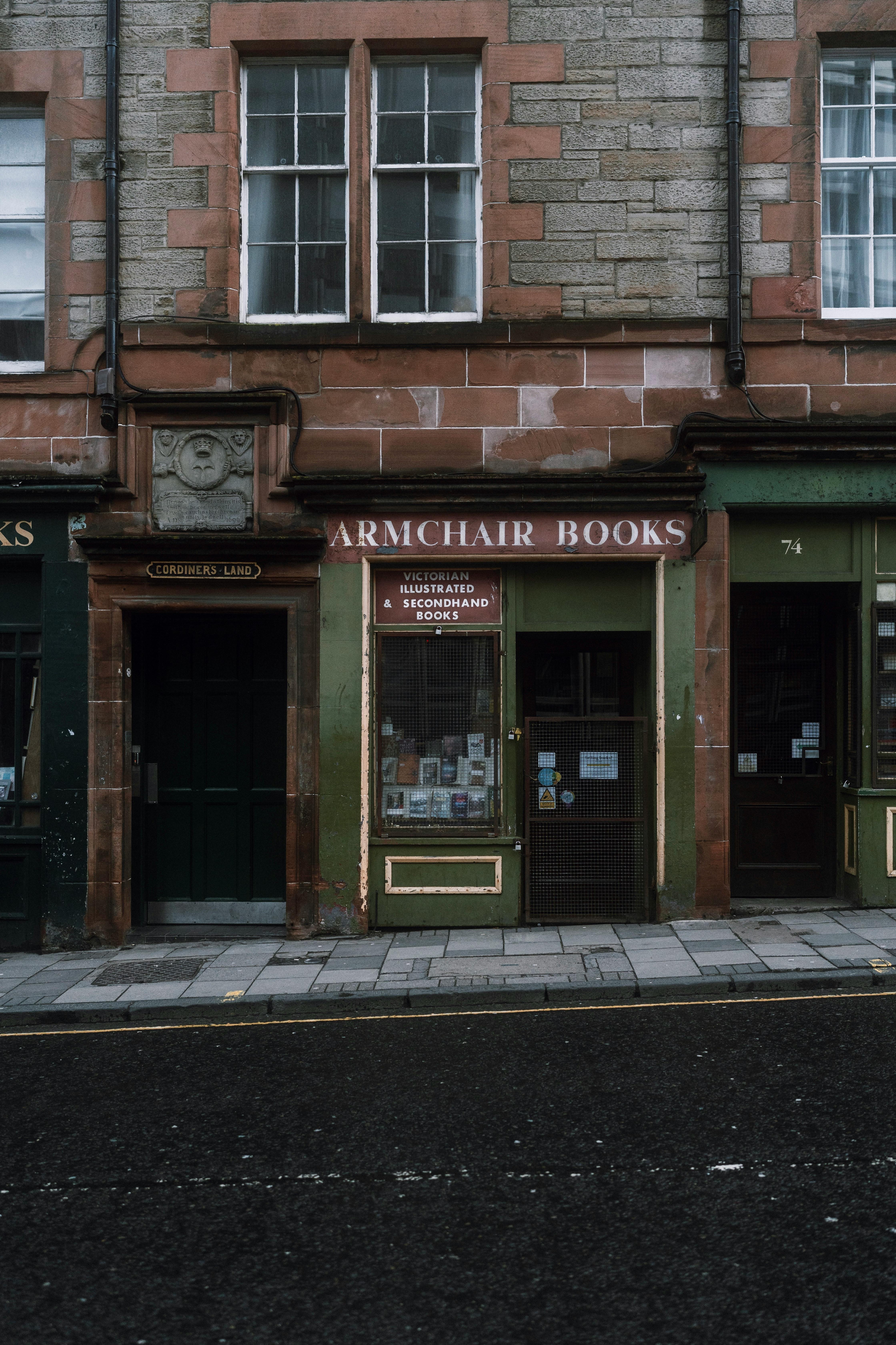 Charming view of Armchair Books on a street in Edinburgh, Scotland.