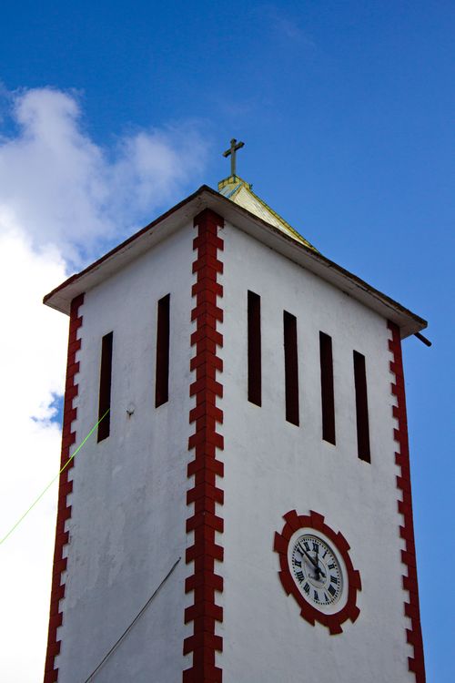 Free Tower with vintage clock design under a clear blue sky in Puebla, Mexico. Stock Photo