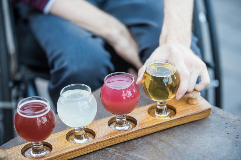 How should ale beer be served and consumed, and what is the ideal temperature for serving? (image 2)