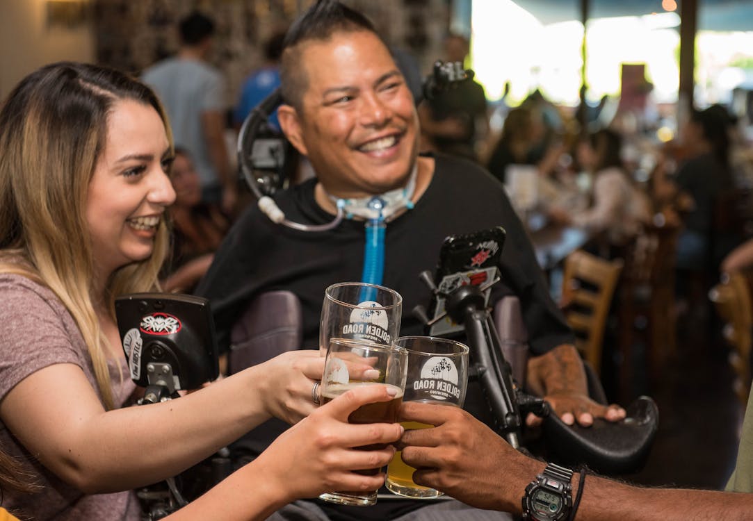 People Toasting Beer Glasses and Having Fun