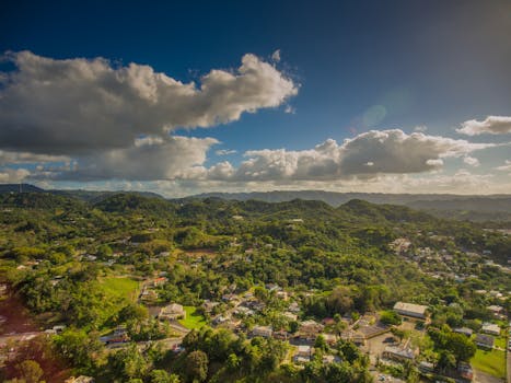 Stunning aerial shot of Bayamón, Puerto Rico showcasing lush greenery and mountainous terrain.
