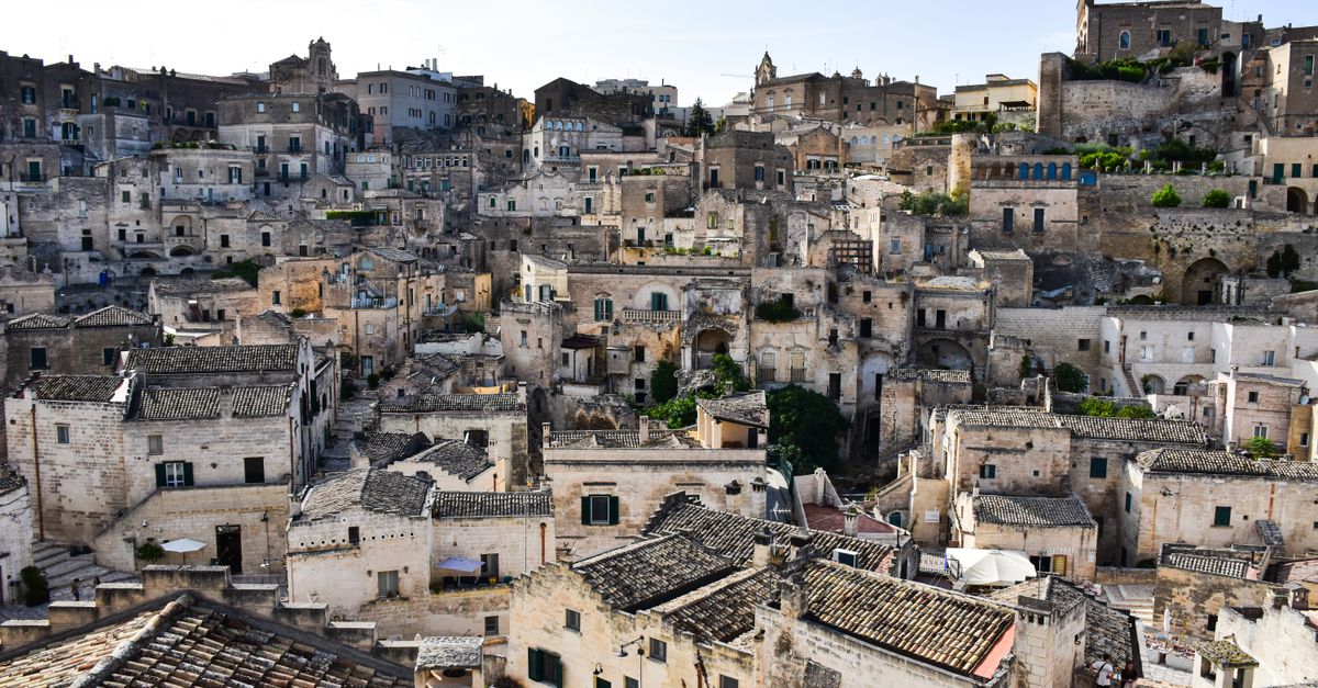 Whitewashed circular old town of Locorotondo Puglia at golden hour