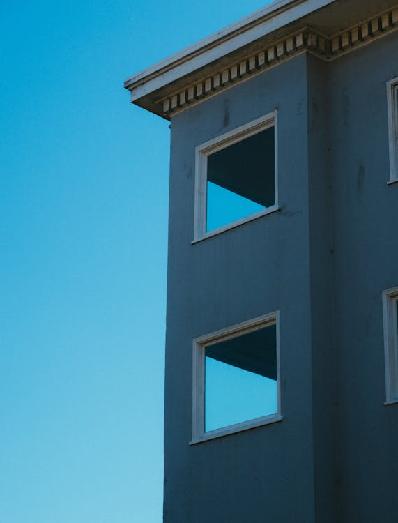 Gray Building With Square Windows