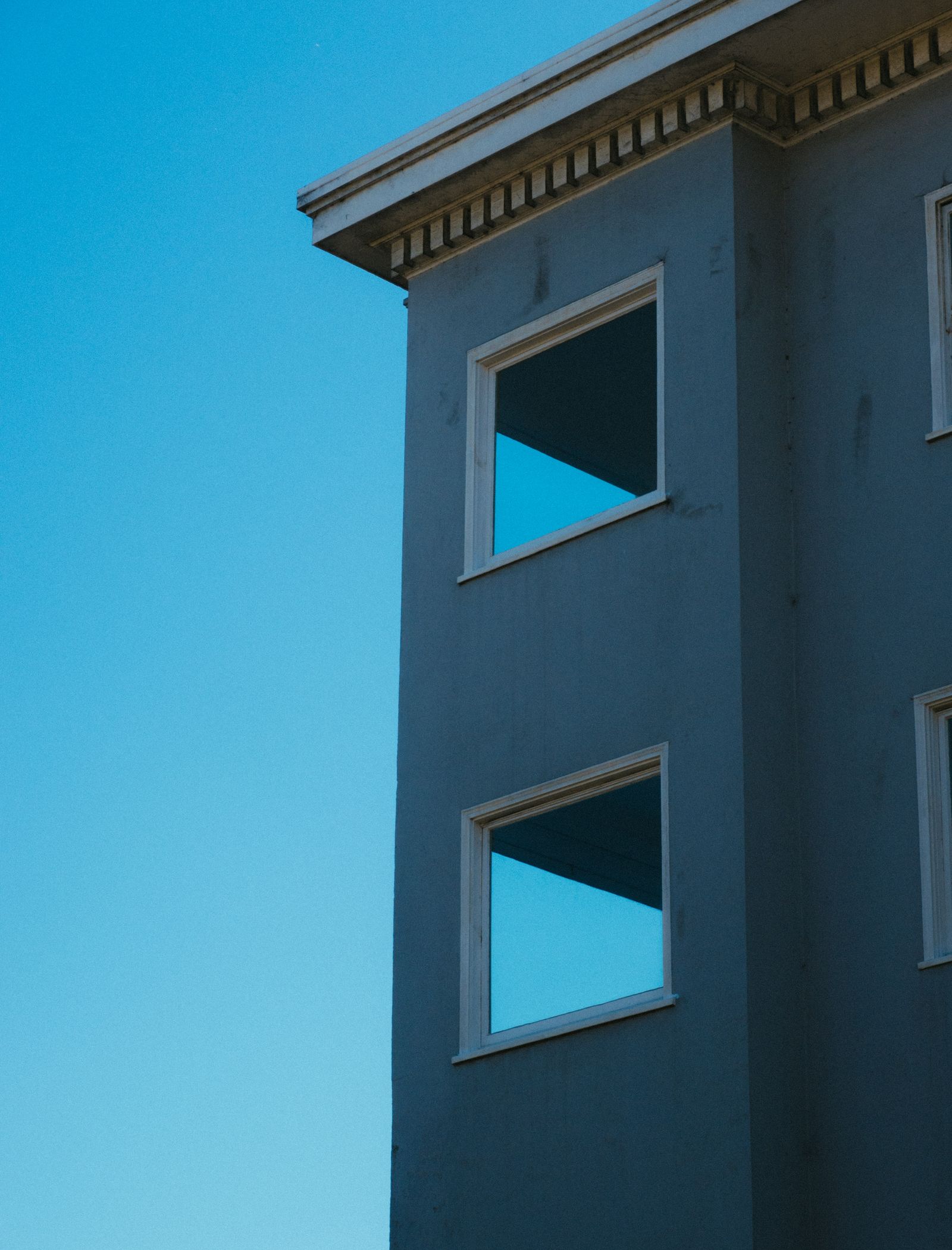Modern commercial building facade with large windows