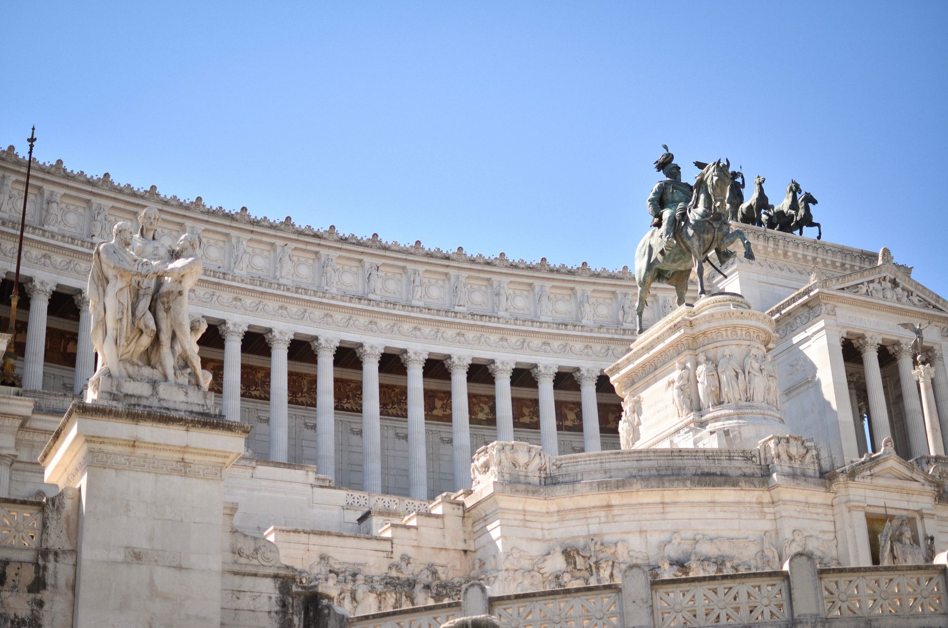 Stunning view of the Altare della Patria in Rome, showcasing historical architecture and majestic statues.