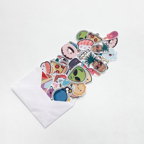 Colourful cartoon stickers spilling from an envelope — photo by Florencia Ceruti on Pexels