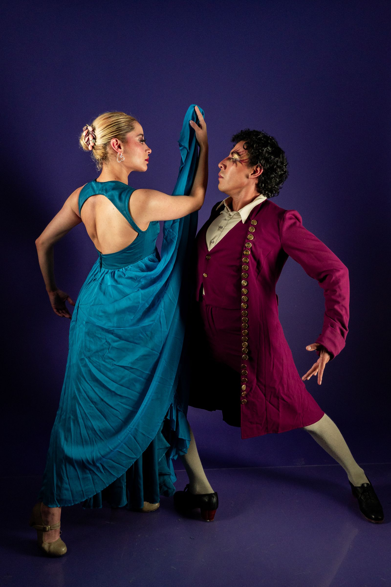 Paso Doble — dramatic Spanish-style couple in matador-inspired costume. Stock photo.