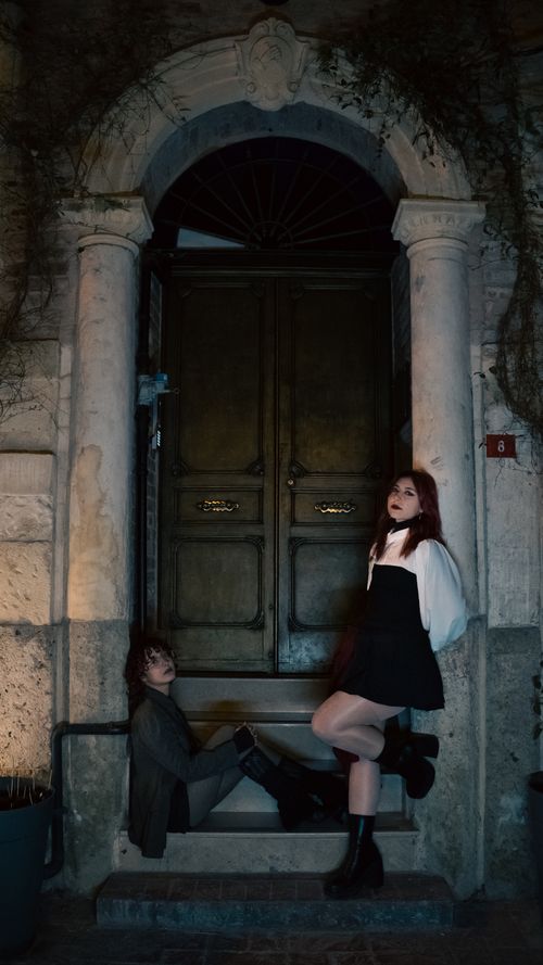 Free Stylish outdoor portrait with a historic Istanbul backdrop featuring two young adults in modern fashion. Stock Photo