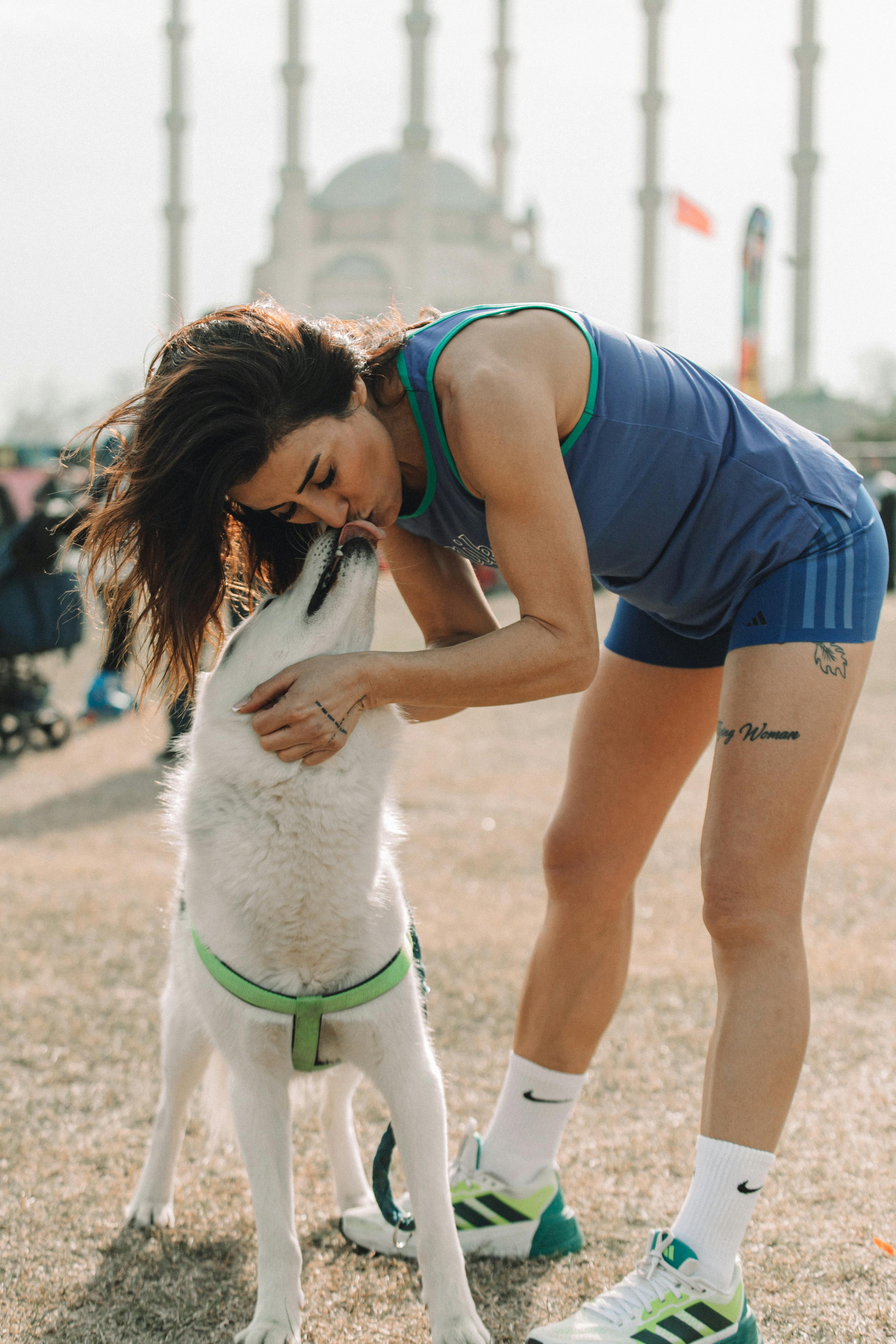 woman enjoying outdoor time with husky in adana