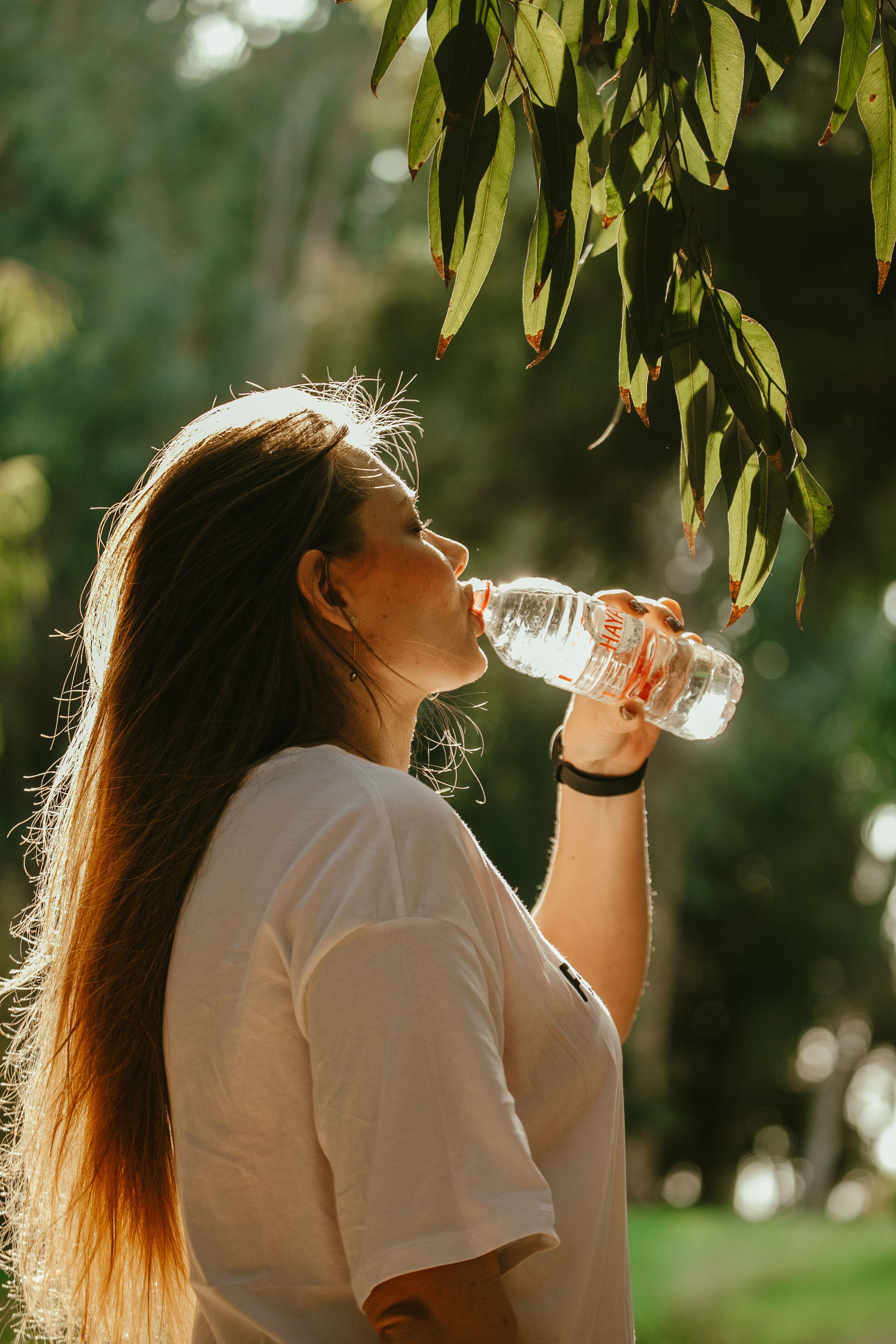 drinking water when training — Woman Drinking Water. Photo: Pexels
