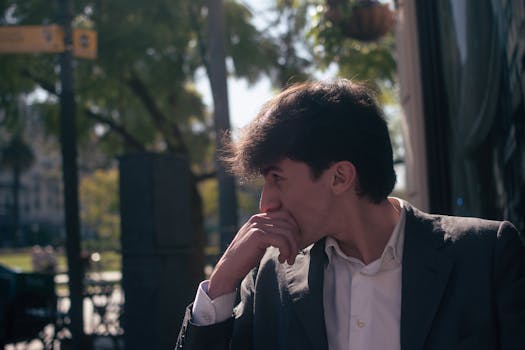 Elegant young man enjoying a sunny day outdoors in Buenos Aires, Argentina.