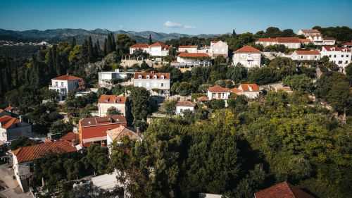 Free Explore the stunning hillside village of Koločep, Croatia, featuring traditional Mediterranean architecture. Stock Photo