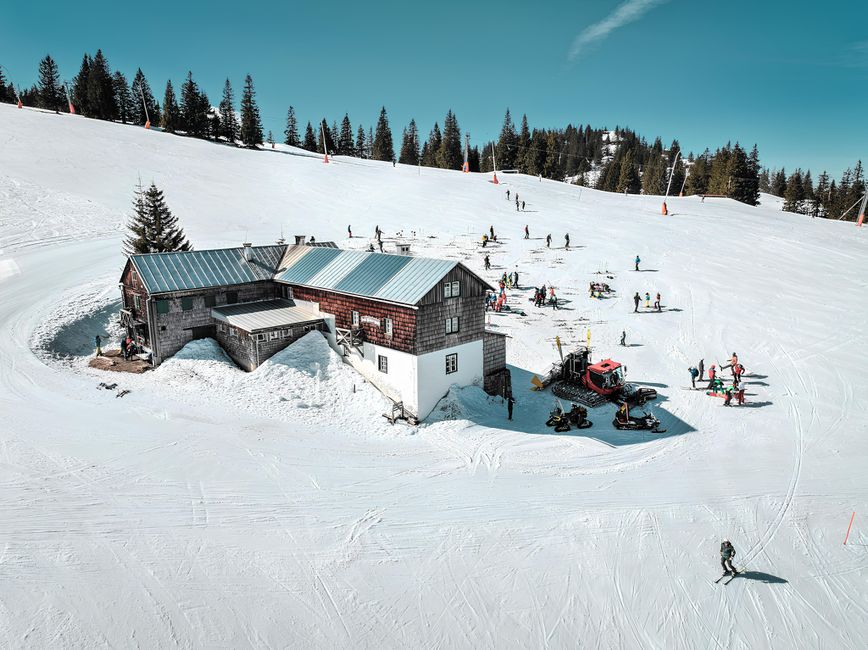 Snow-covered alpine chalet in winter