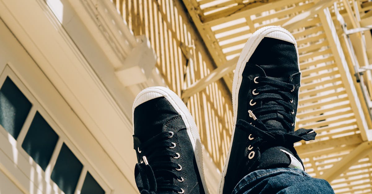 Person Wearing Black Sneakers · Free Stock Photo