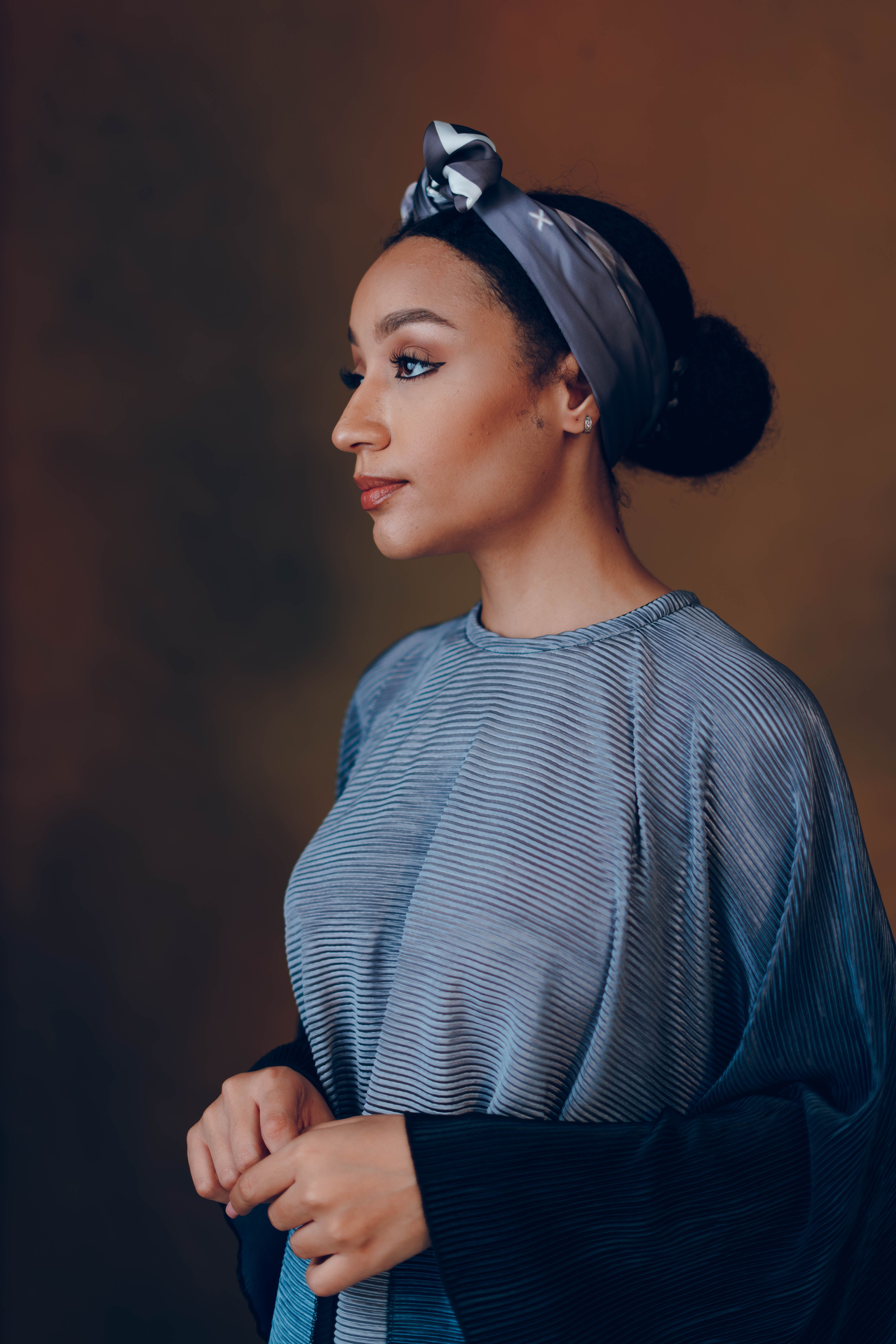 Elegant Portrait of a Woman in Blue Dress · Free Stock Photo