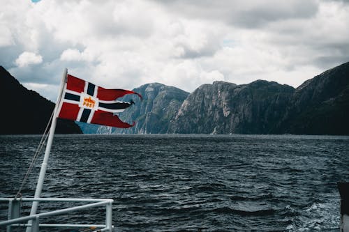 Red and Blue Flag on Boat