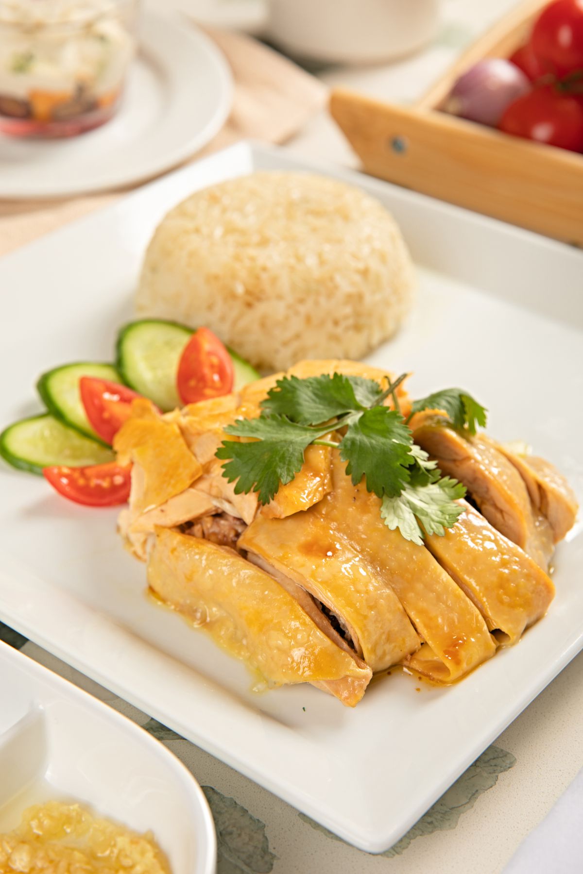 Cantonese-style chicken rice dish in a bowl