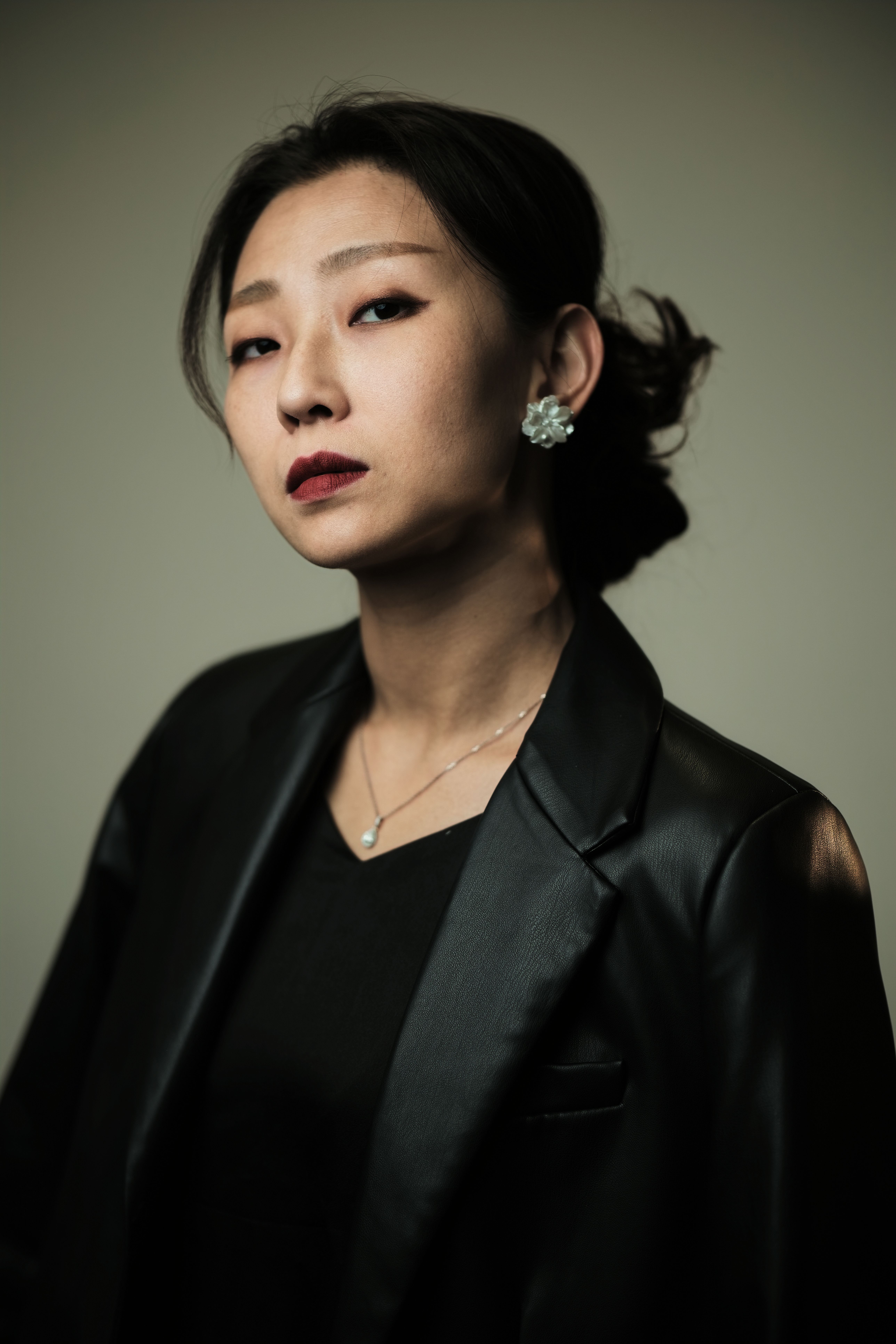 Portrait of an Elegant Woman in Black Suit · Free Stock Photo