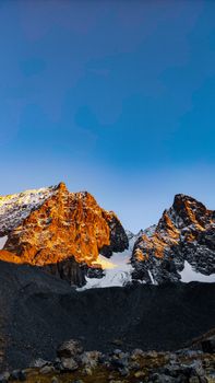 Beautiful sunset illuminating the snowy peaks of Kaçkar Mountains in Rize, Türkiye.