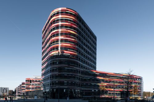 Free A striking modern building with curved facade located in Hamburg. Stock Photo