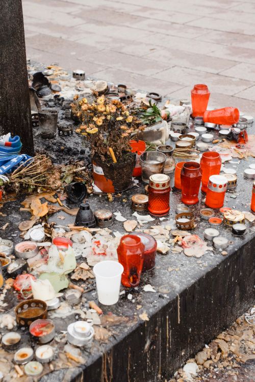 Free Colorful shrine with candles and offerings in Novi Sad, Serbia, witnessing local traditions and memories. Stock Photo