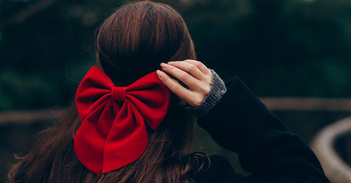 Red Ribbon Pathway Woman with Red Ribbon in Hair on a Pathway · Free Stock Photo