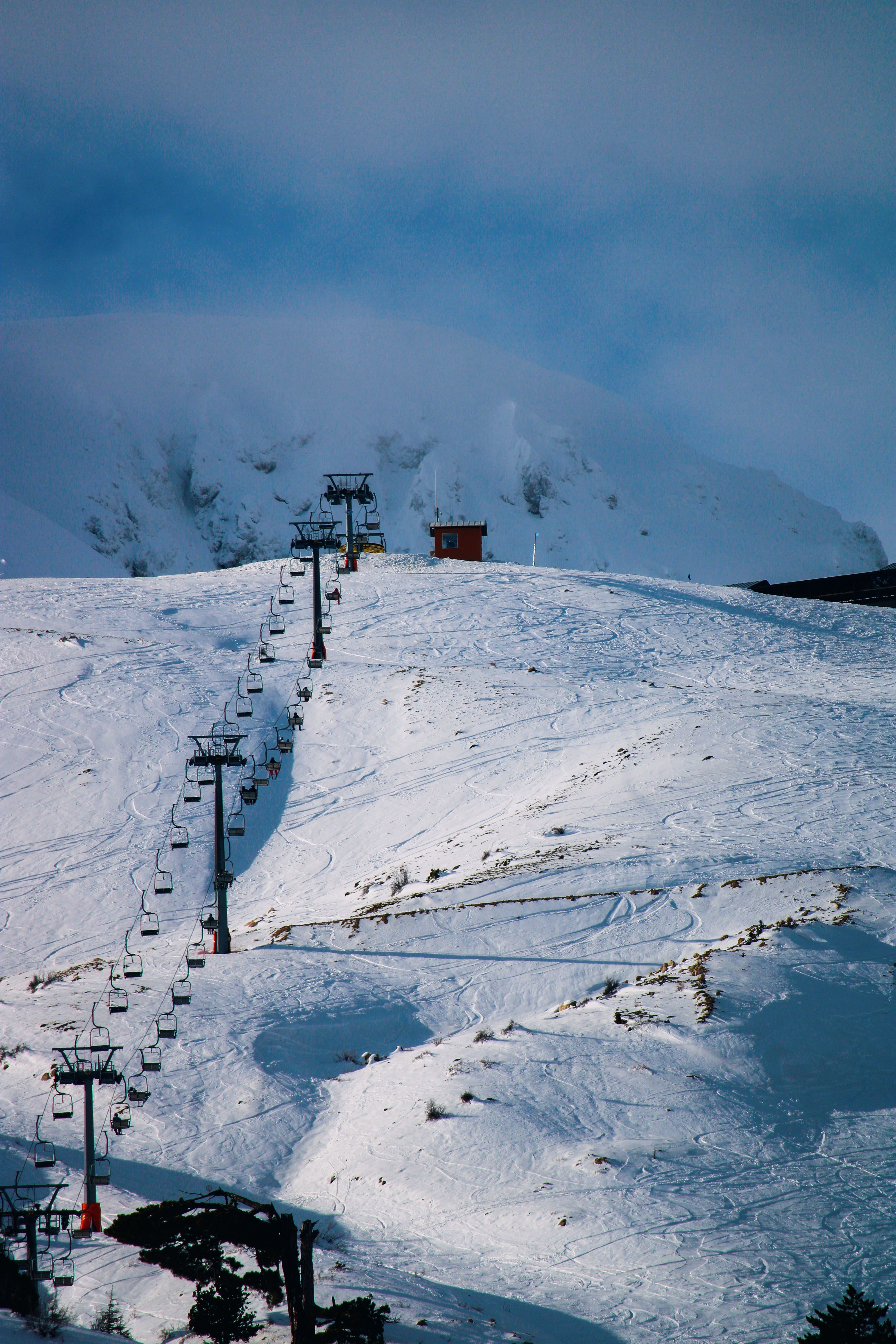 Scenic Snowy Mountain Landscape with Ski Lift · Free Stock Photo