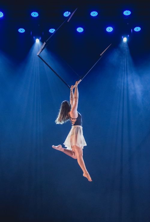 Free A captivating aerial dance performance showcasing artistic elegance on stage in Brazil. Stock Photo