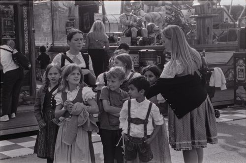 Free Children and adults in traditional Bavarian costumes at Oktoberfest in Germany. Stock Photo