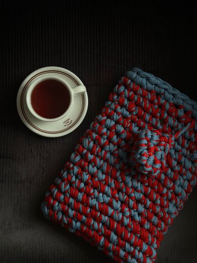 Crochet trivet beside a cup of tea — photo by Hilal Serin on Pexels