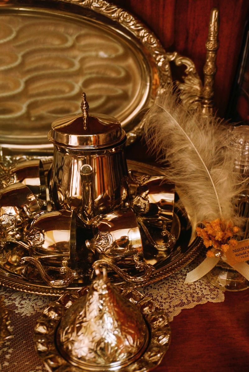 A vintage silver tea set with tray, showing patina and age that affect condition and value