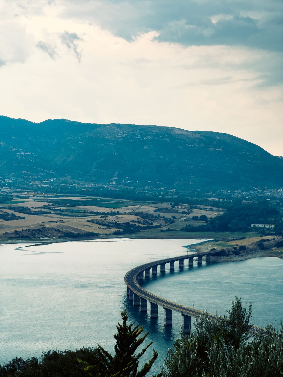 Bridge Over View Scenic Bridge Over River with Mountain View · Free Stock Photo