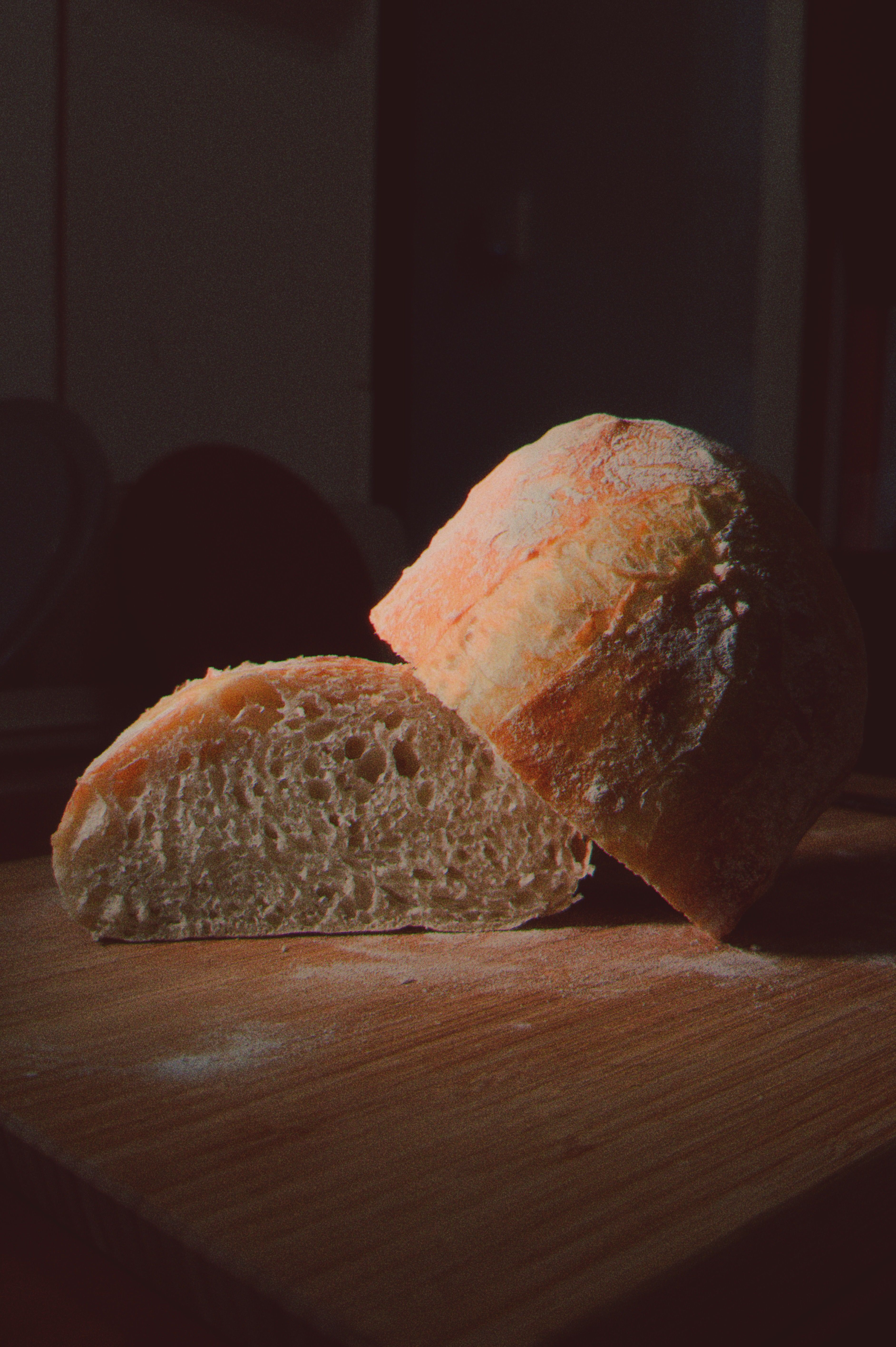 Rustic Loaf of Fresh Bread on Wooden Board · Free Stock Photo