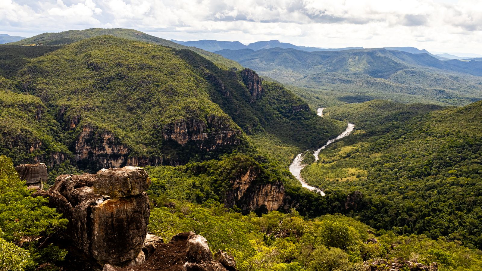 Lush green canyon with winding river, Madagascar