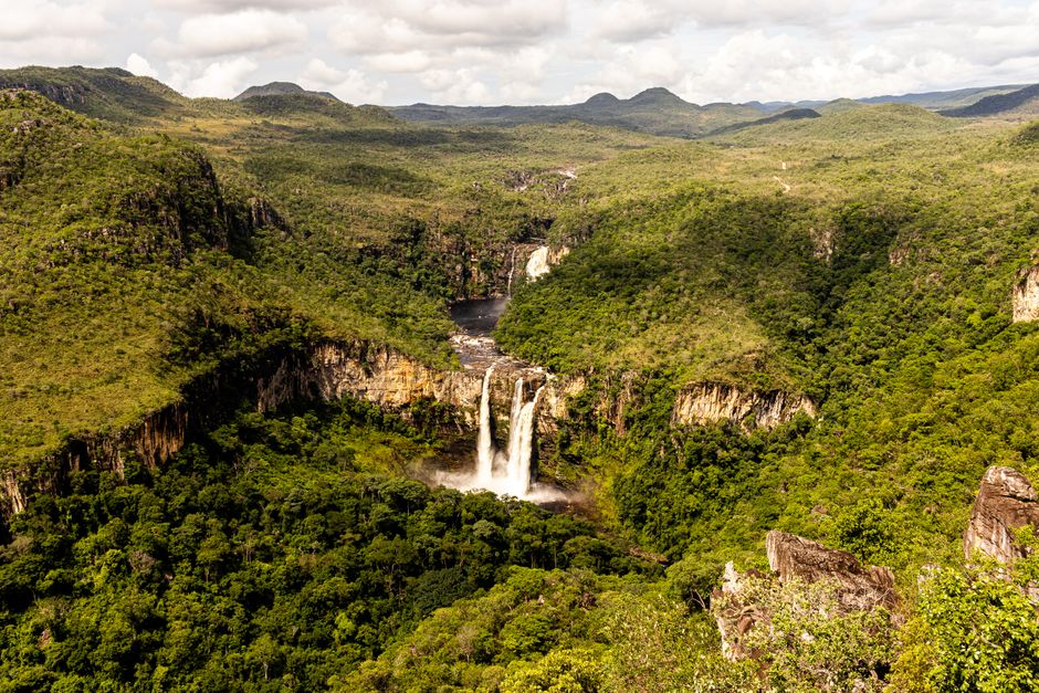 Best Adventure in the Amazon 5D/4N At Amazon Peacock Paradise Ecolodge Review: Justin's Complete Guide to Brazil's Ultimate Jungle Experience Review 2026 - A breathtaking aerial view of a waterfall amidst lush greenery in Brazil's national park.