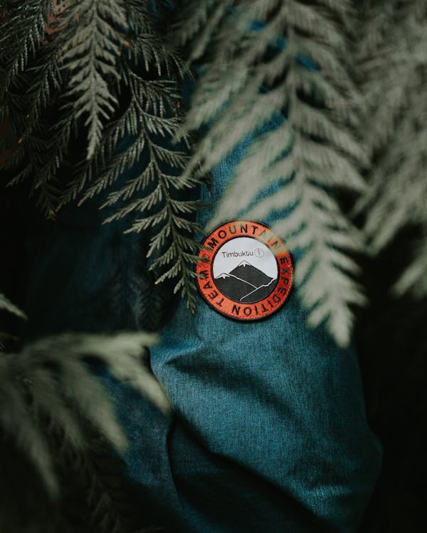 Free Selective Photography of a Mountain Expedition Team Badge Stock Photo