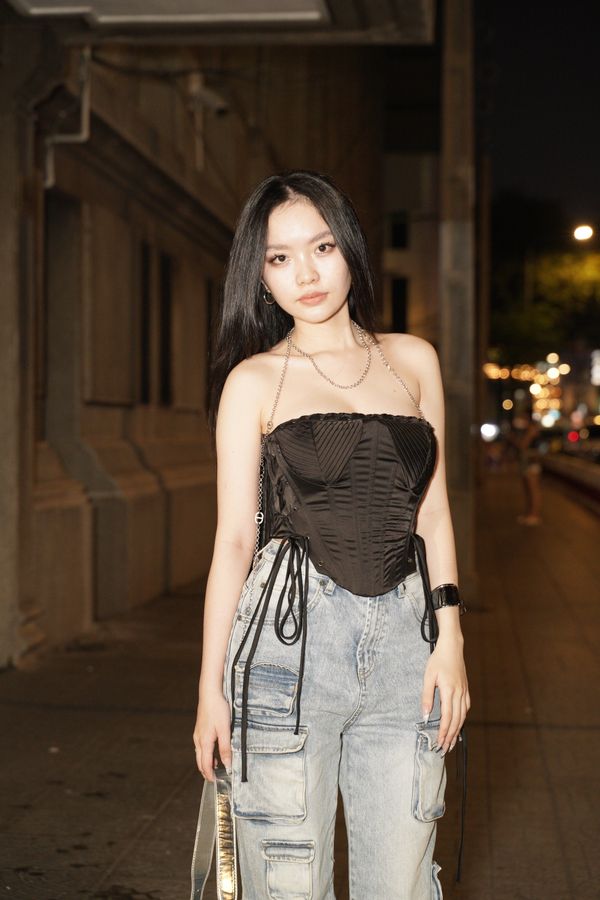 Black corset top with barrel jeans