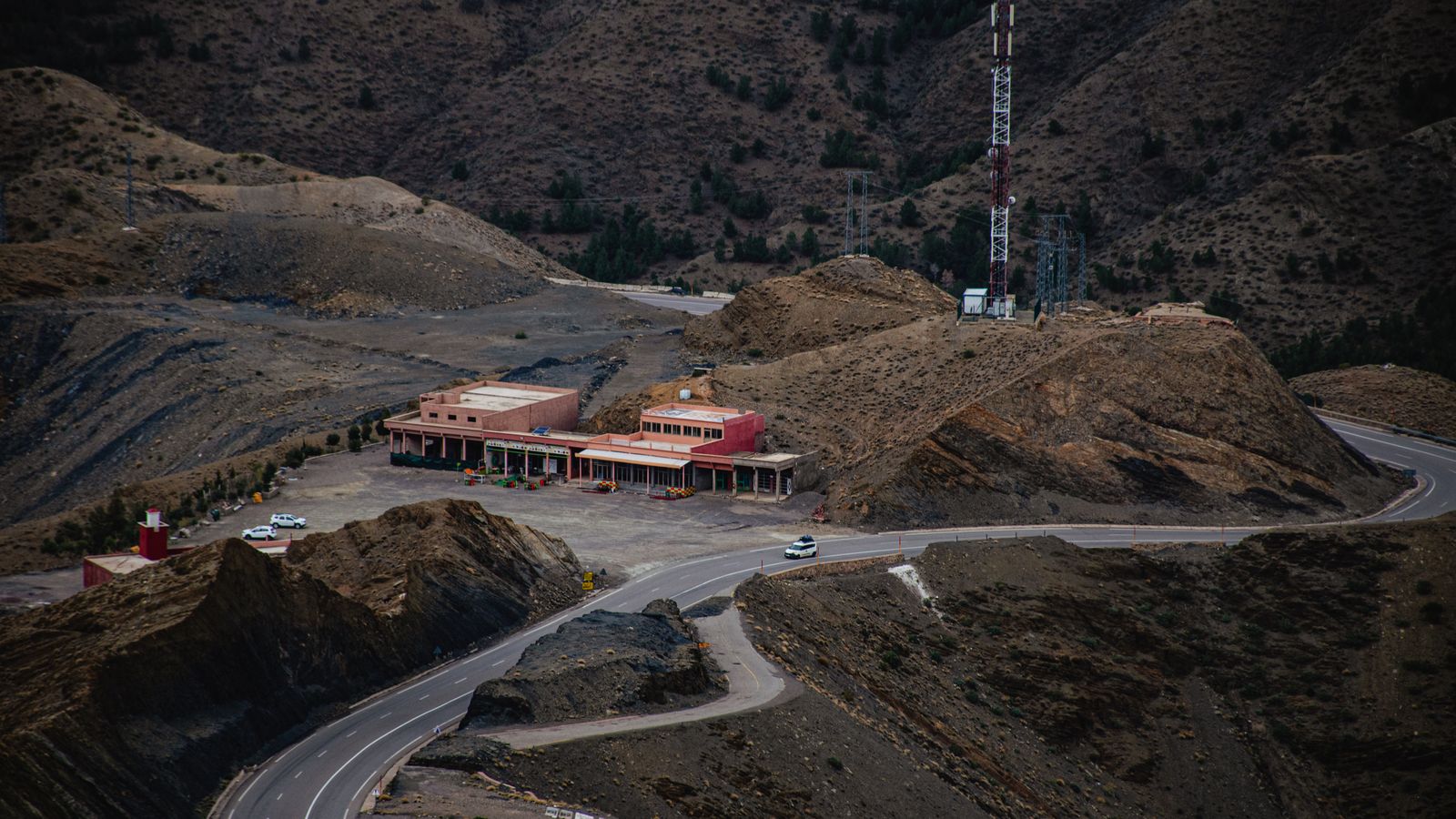 Scenic winding road through Atlas Mountains Morocco sunset drive from Ouarzazate to Marrakech