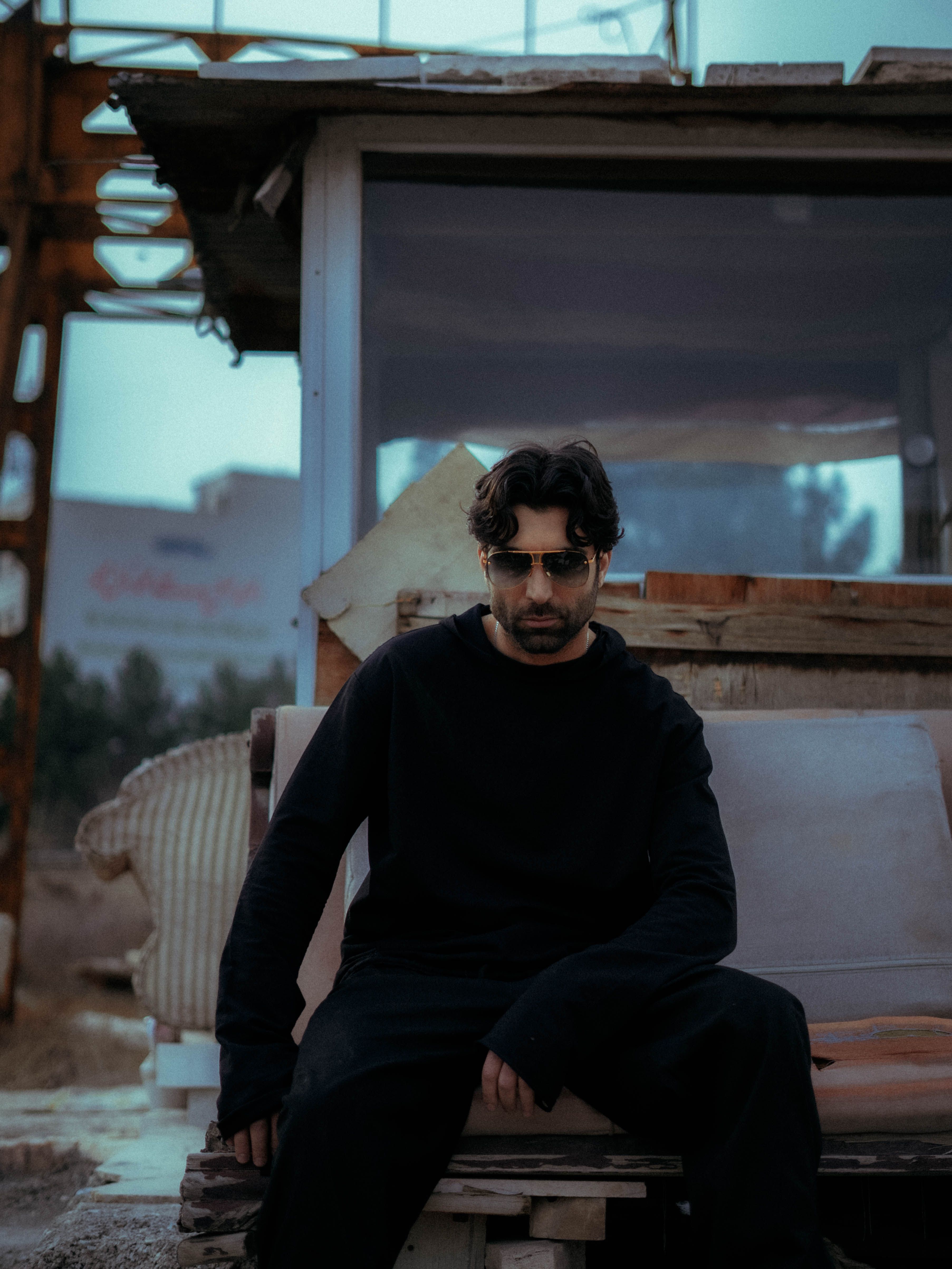 Moody Portrait of Man in Urban Setting · Free Stock Photo
