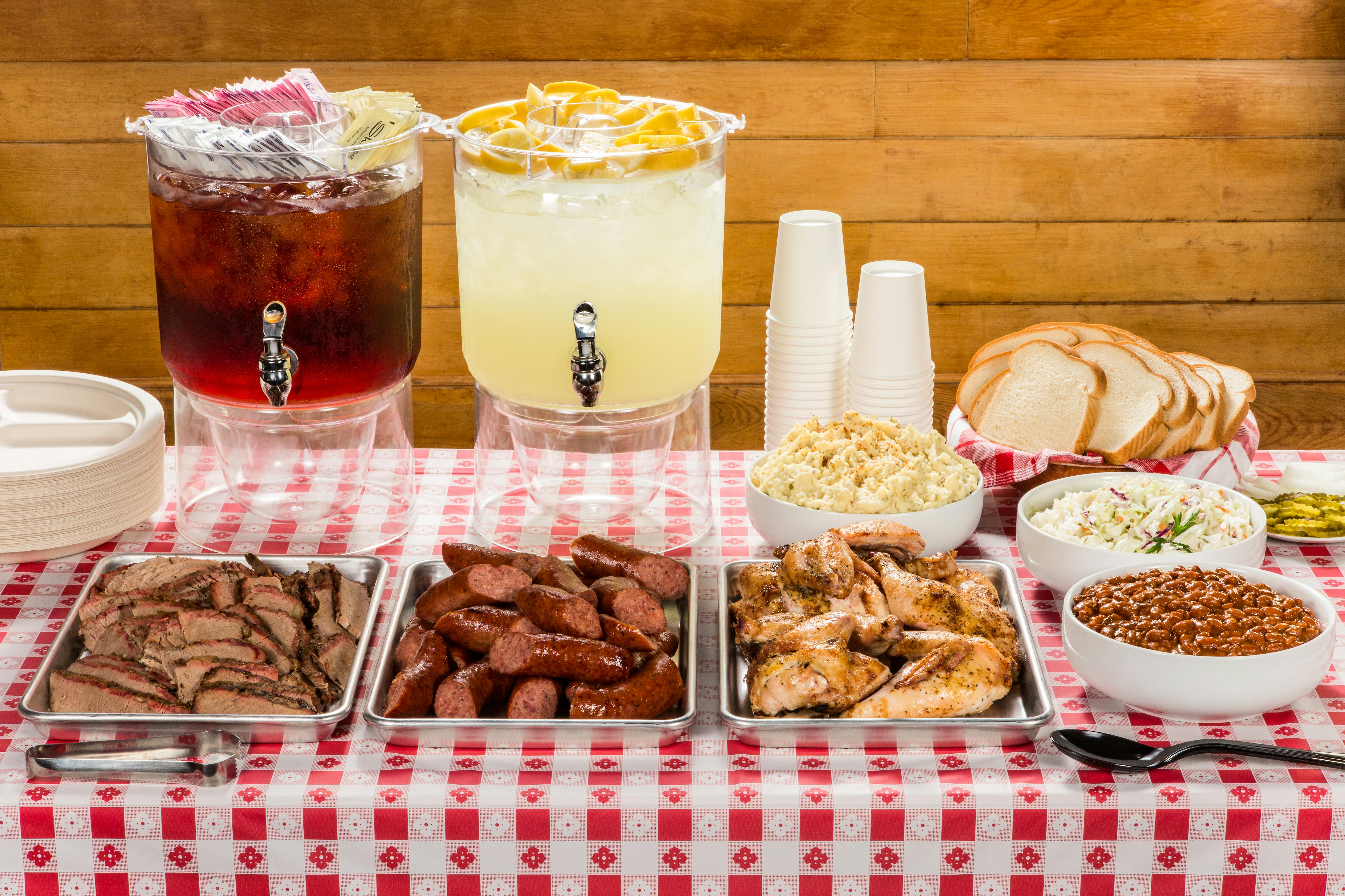 Mouth-watering Texas barbecue spread featuring meats, sides, and drinks. Perfect for BBQ lovers.