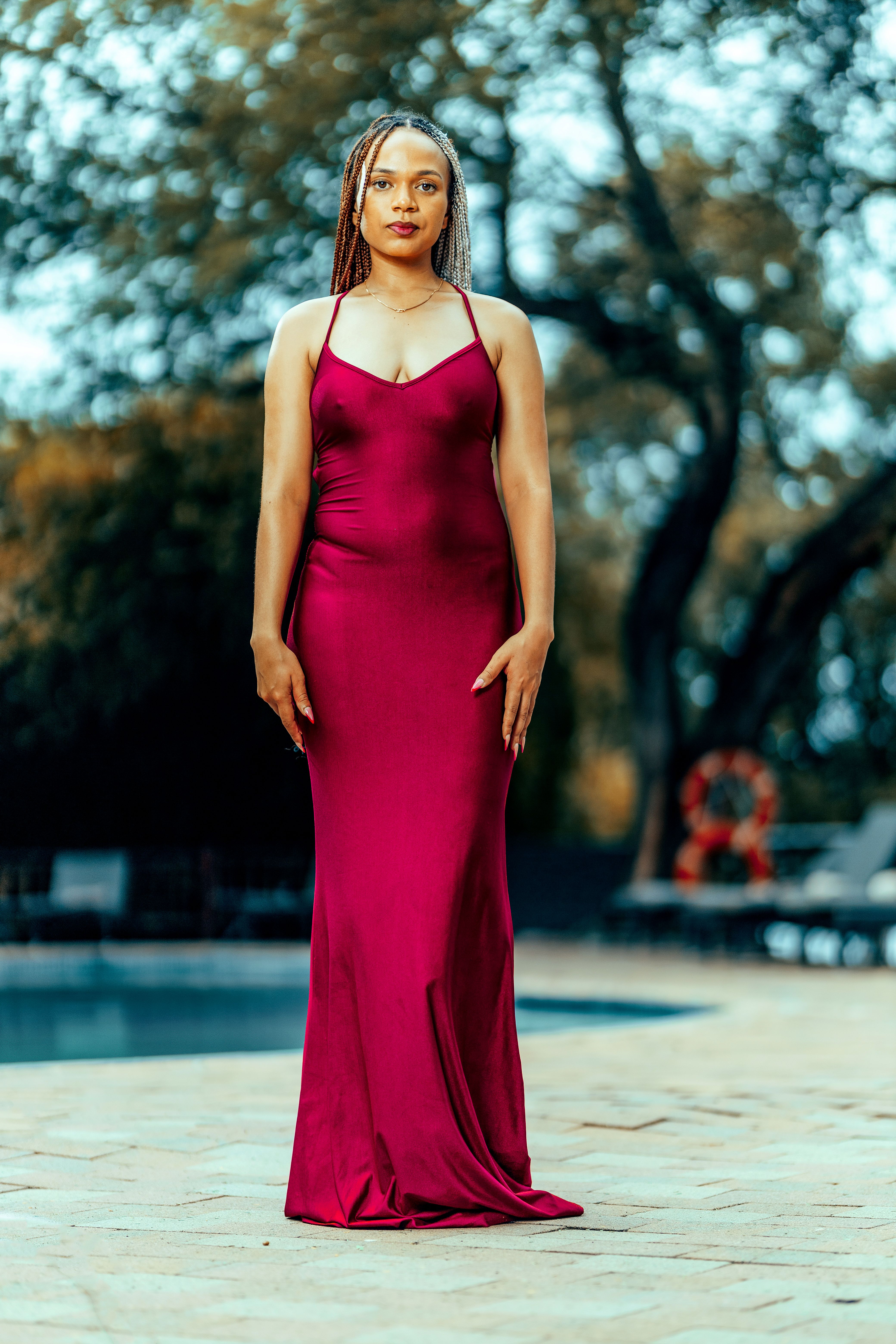 Elegant Woman in Red Dress by Poolside · Free Stock Photo