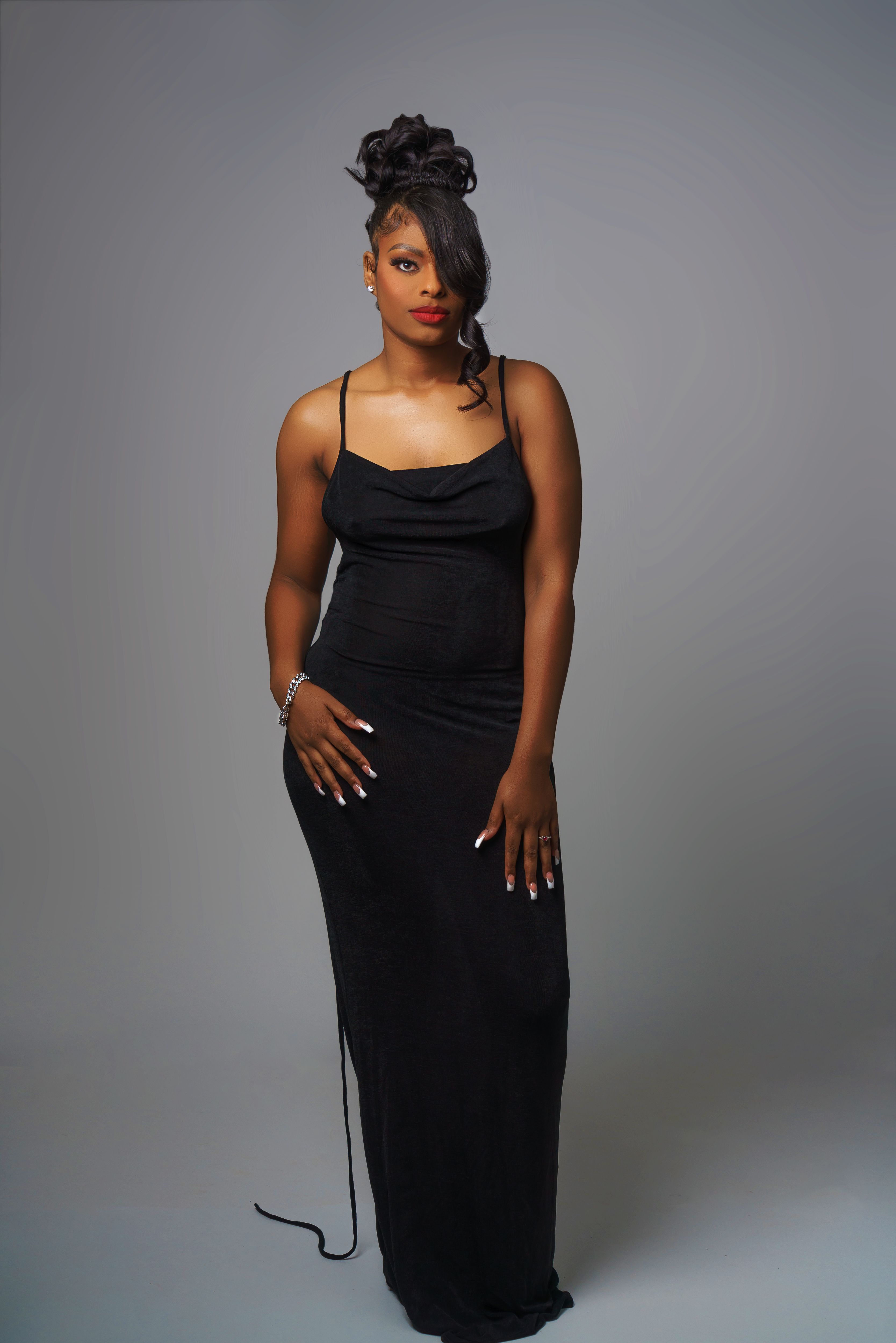 Elegant Evening Portrait of a Woman in Black Gown · Free Stock Photo
