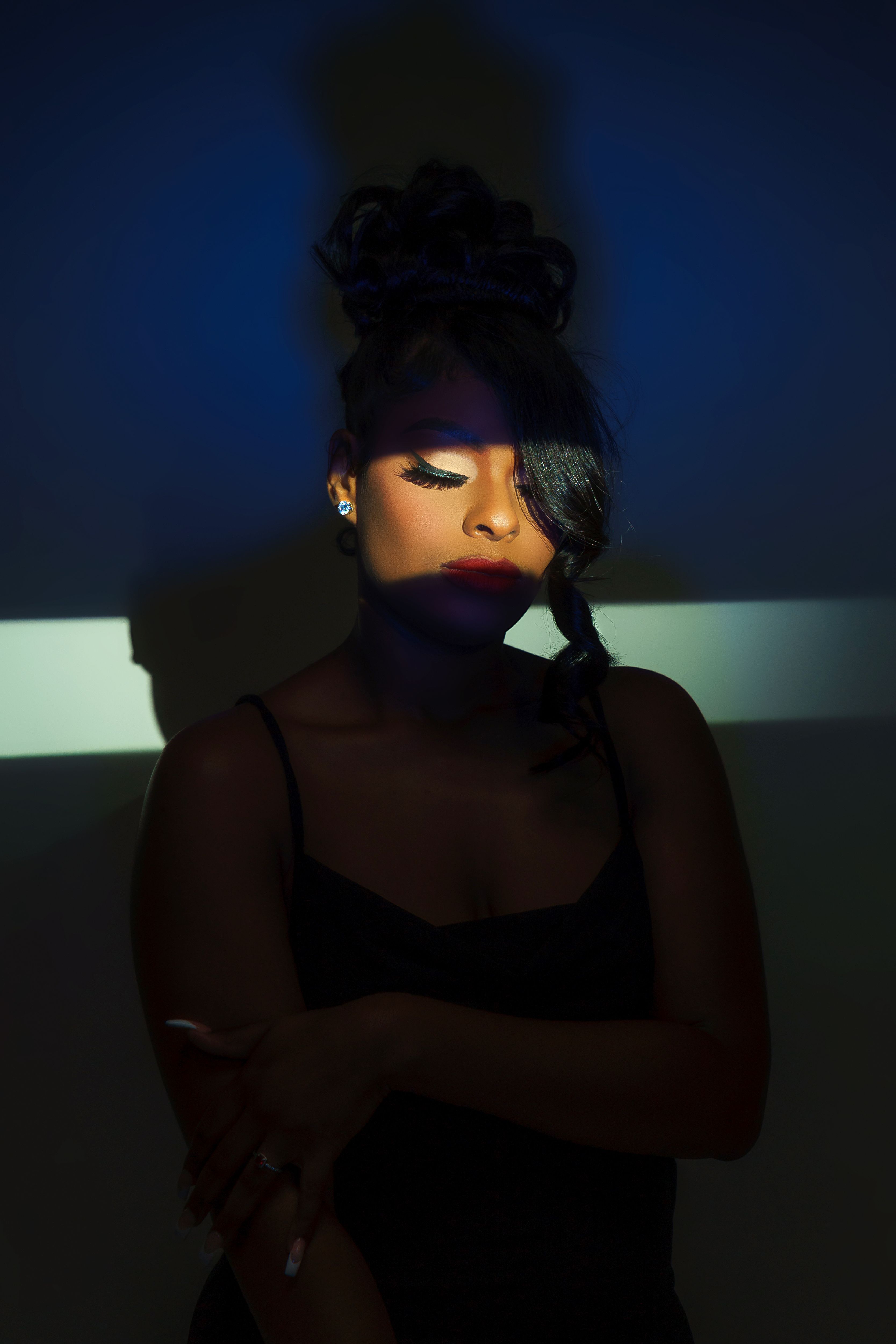 Stunning Portrait with Dramatic Blue Lighting · Free Stock Photo