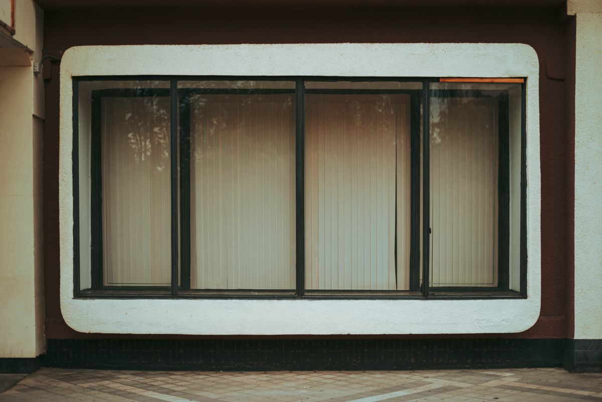 Glass panelled wall catching daylight